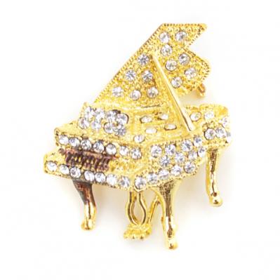 gld piano pin.jpg